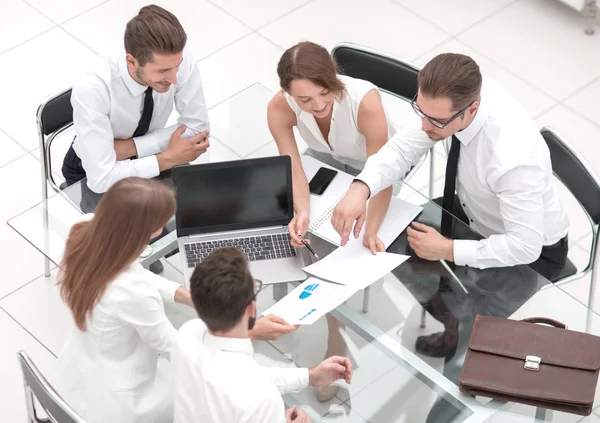 Business team discusses the results of their successful collaboration. — Stock Photo, Image