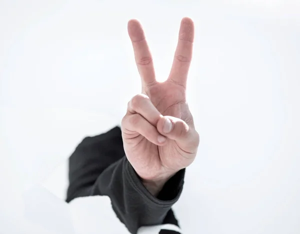Mano close up.businessman mostrando un gesto de victoria  . —  Fotos de Stock