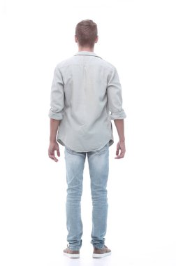 arka görüş. Genç adam kopya alanı seyir kot pantolon