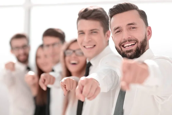 Happy business team pointing at you. — Stock Photo, Image