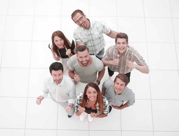 Top view.un feliz equipo de jóvenes — Foto de Stock