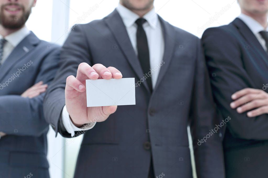 business team leader showing business card