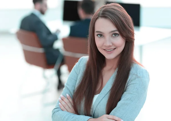 Business woman on blurred background office — Stock Photo, Image