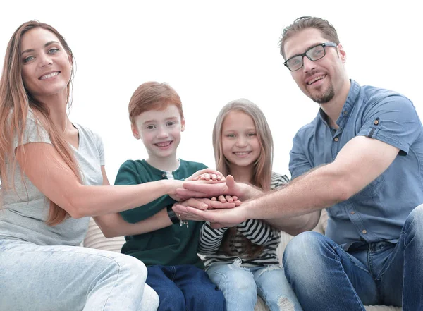 Família feliz fazendo uma torre com suas mãos — Fotografia de Stock