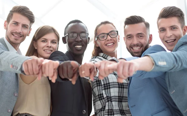 Portrait of excited young business people pointing at you — Stock Photo, Image