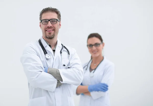 Médico y enfermera sobre un fondo claro . — Foto de Stock