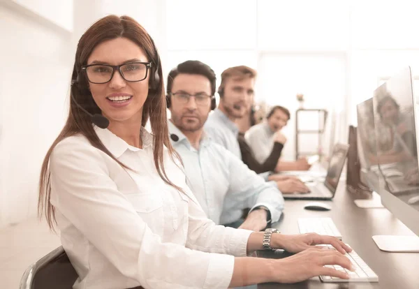 Woman operator in the workplace at the call center — Stock Photo, Image