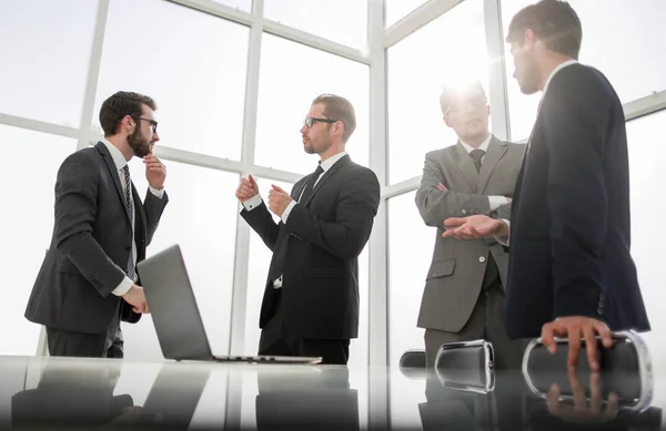 Business team standing in the office of the business center — Stock Photo, Image