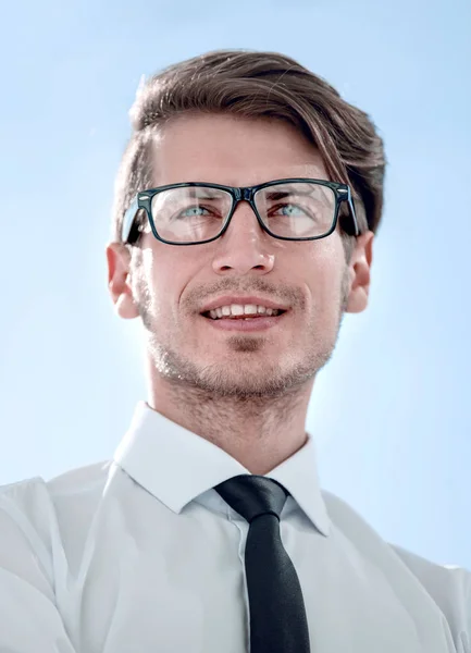 Close up. confident businessman standing near the office window — стоковое фото