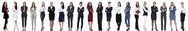 Group of successful young businesswoman standing in a row — Stock Photo, Image