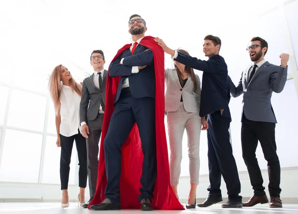 Boss is a superhero and the business team is standing together — Stock Photo, Image