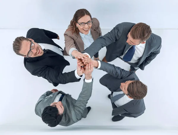 Top view .the business team gives each other a high five — Stock Photo, Image