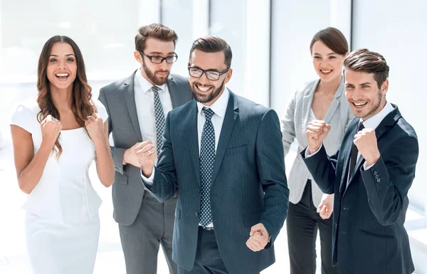 Happy business team standing in office. — Stock Photo, Image