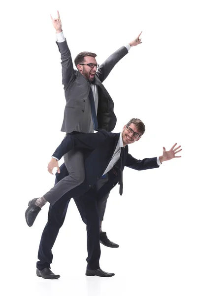 Homem de negócios feliz carregando seu colega no piggyback — Fotografia de Stock