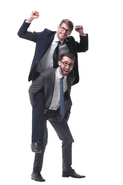 Hombre de negocios sonriente sentado en la espalda de su colega — Foto de Stock