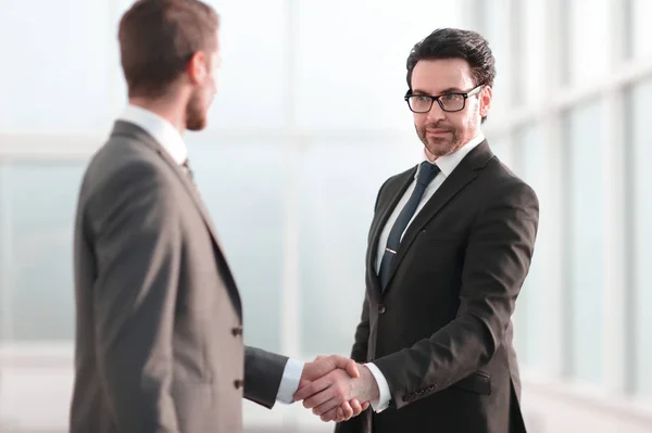 Friendly handshake of business partners — Stock Photo, Image