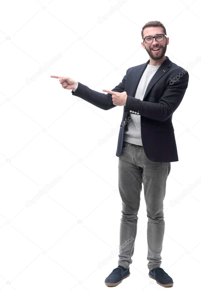 smiling business man pointing to the side at copy space