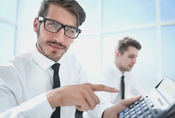Smiling accountants discussing reports at the office — Stock Photo, Image