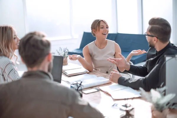 business team discussing ideas at meeting in office