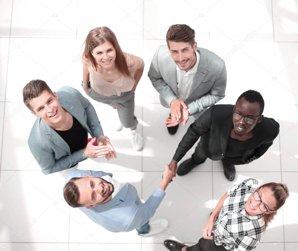 Top view of multiracial young creative people in modern office