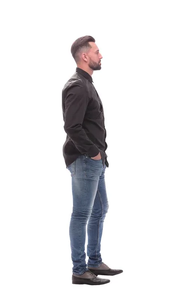 Vista lateral. hombre joven moderno en jeans — Foto de Stock