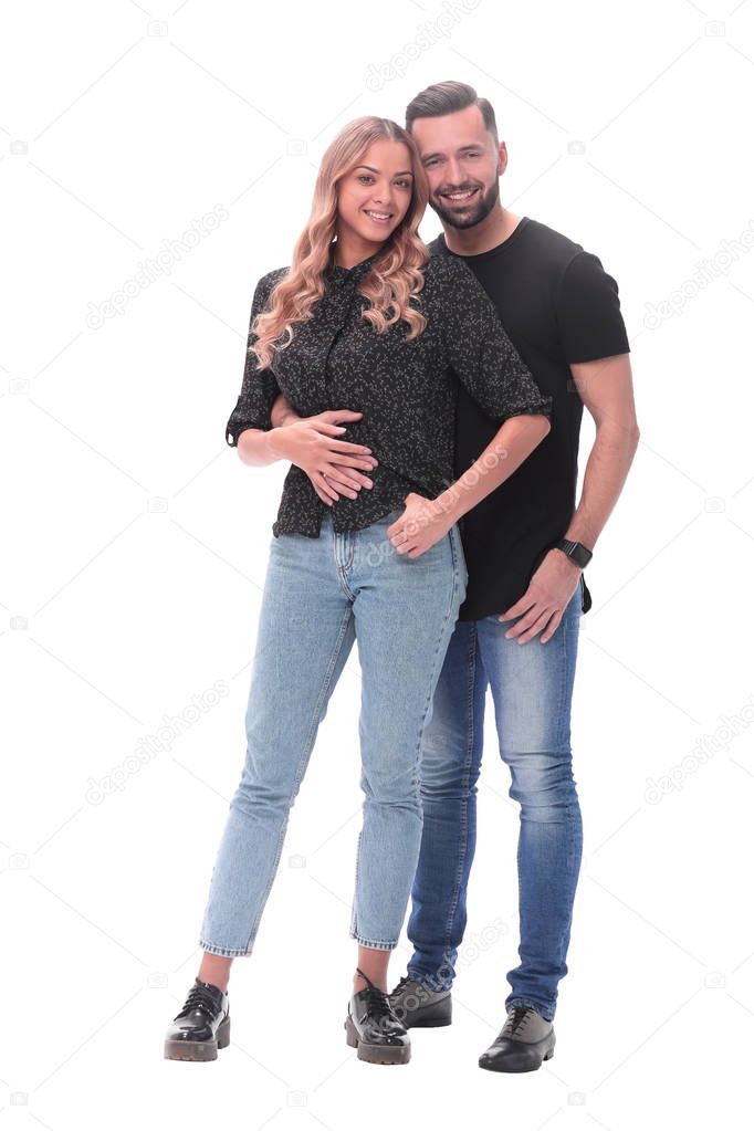 in full growth. young couple in love standing together
