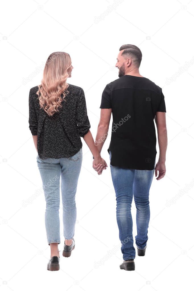 rear view. modern young couple walking together