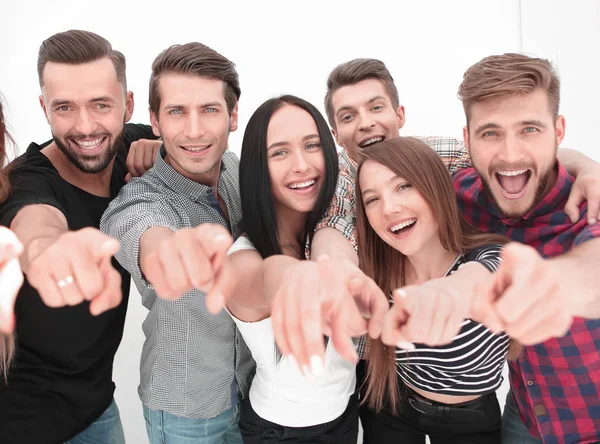 Close up. a fun team of young people pointing at you — стоковое фото