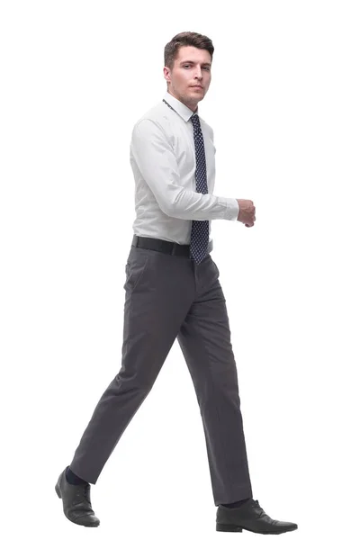 Successful young businessman confidently goes forward.isolated on white — Stock Photo, Image