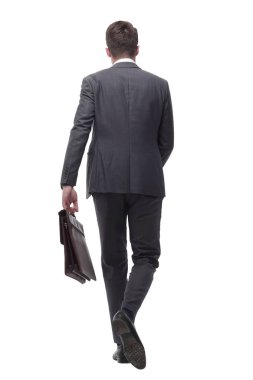 arka görünüm. emin işadamı güvenle öne çıkıyor .