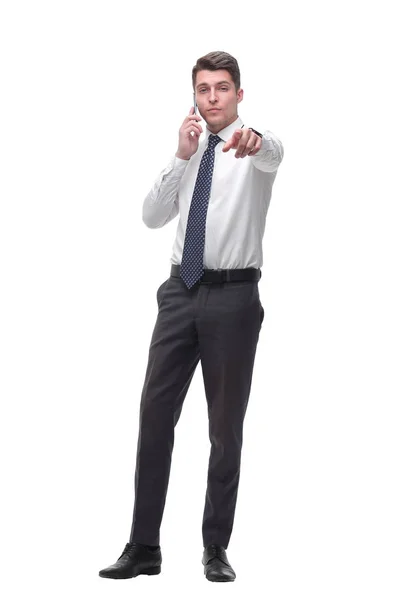 Successful young businessman talking on mobile phone. isolated on white — Stock Photo, Image