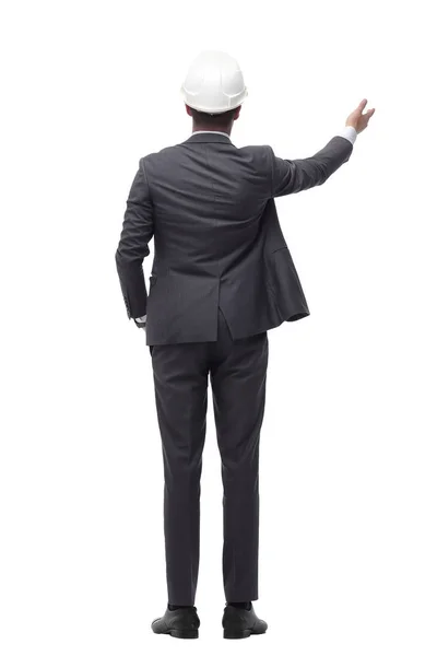 Businessman in hard-hat looking at blank white screen. isolated on white — Stock Photo, Image