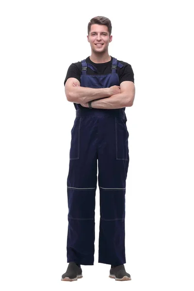 Portret van een zelfverzekerde man in overalls. geïsoleerd op wit — Stockfoto