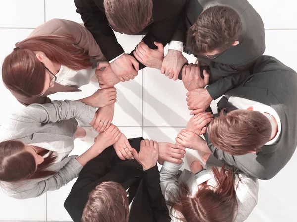 Το Top view. η ομάδα επιχειρήσεων που σχηματίζουν έναν κύκλο — Φωτογραφία Αρχείου