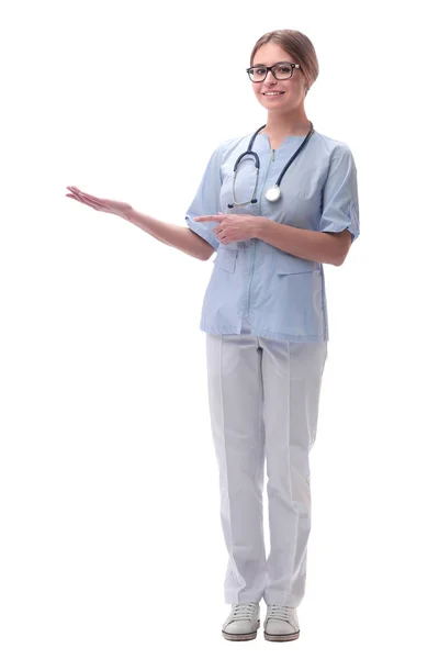 Friendly woman doctor looking at copy space. isolated on white — Stock Photo, Image