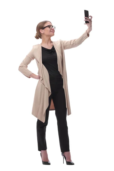 Joven mujer de moda tomando una selfie. aislado en blanco — Foto de Stock
