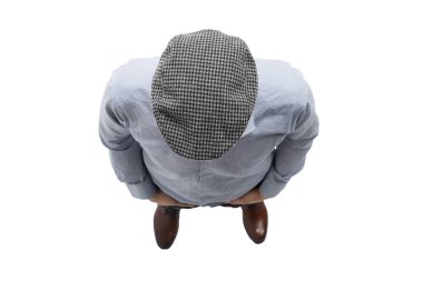 üst görünüm. damalı şapkalı genç bir adam