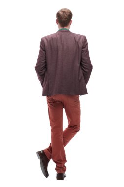 arka görünüm. beyaz boş ekranın önünde duran genç adam