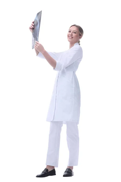 Competent woman doctor looking at x-ray. isolated on white — Stock Photo, Image