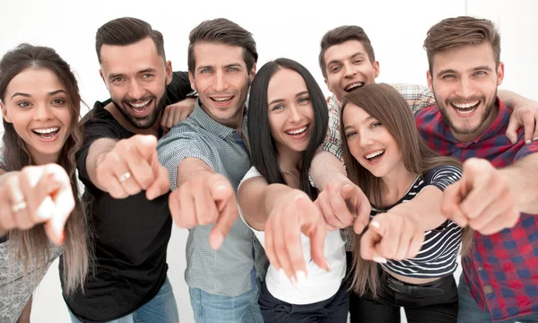 Close up.a fun team of young people pointing at you — Stock Photo, Image