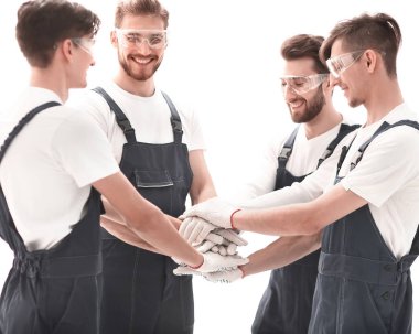 Yakın plan. Bir grup işçi daireler çiziyor..