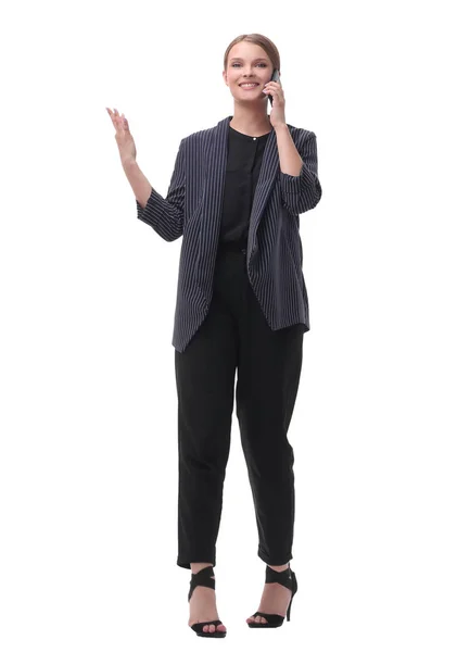 O tânără femeie de afaceri vorbind pe un telefon mobil — Fotografie, imagine de stoc