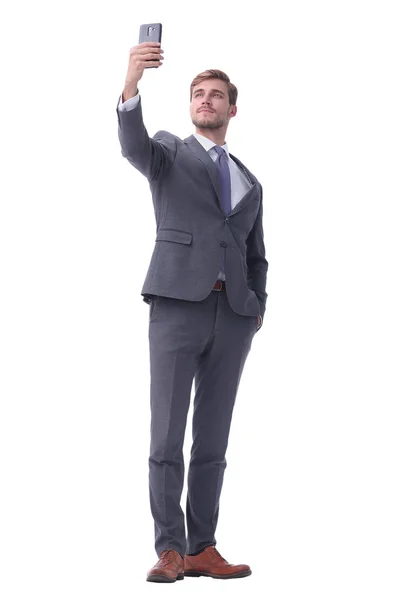 In full growth. smiling businessman taking selfie. — Stock Photo, Image