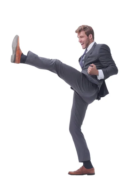 En pleine croissance. homme d'affaires souriant poussant hors du mur — Photo