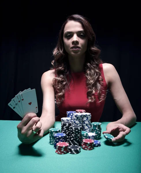 Beautiful woman with casino chips a black — Stock Photo, Image