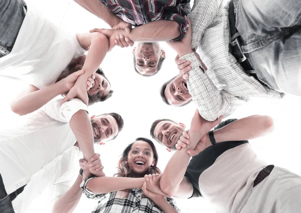 Grupo feliz de empresários empilhando suas mãos em cooperação — Fotografia de Stock