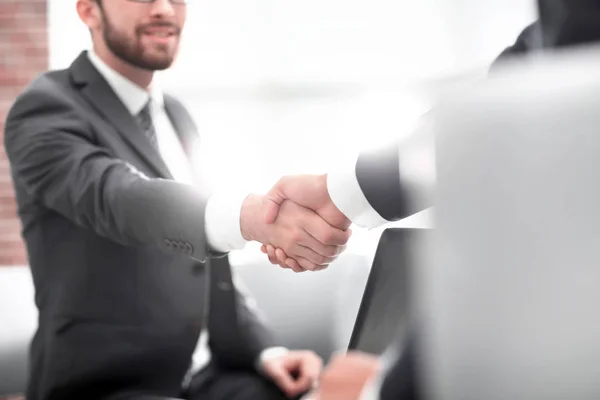 Confident businessman shaking hands at officce — Stock Photo, Image