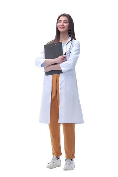 Smiling woman doctor with clipboard .isolated on white background — Stock Photo, Image