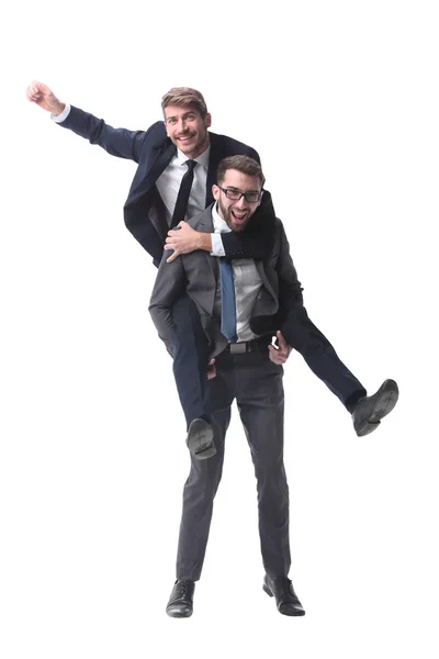 Glad affärsman bär sin kollega på piggyback — Stockfoto