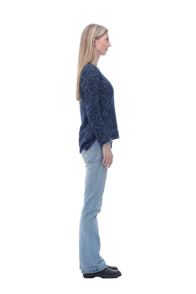 Side view. modern young woman in jeans looking at camera — Stock Photo, Image